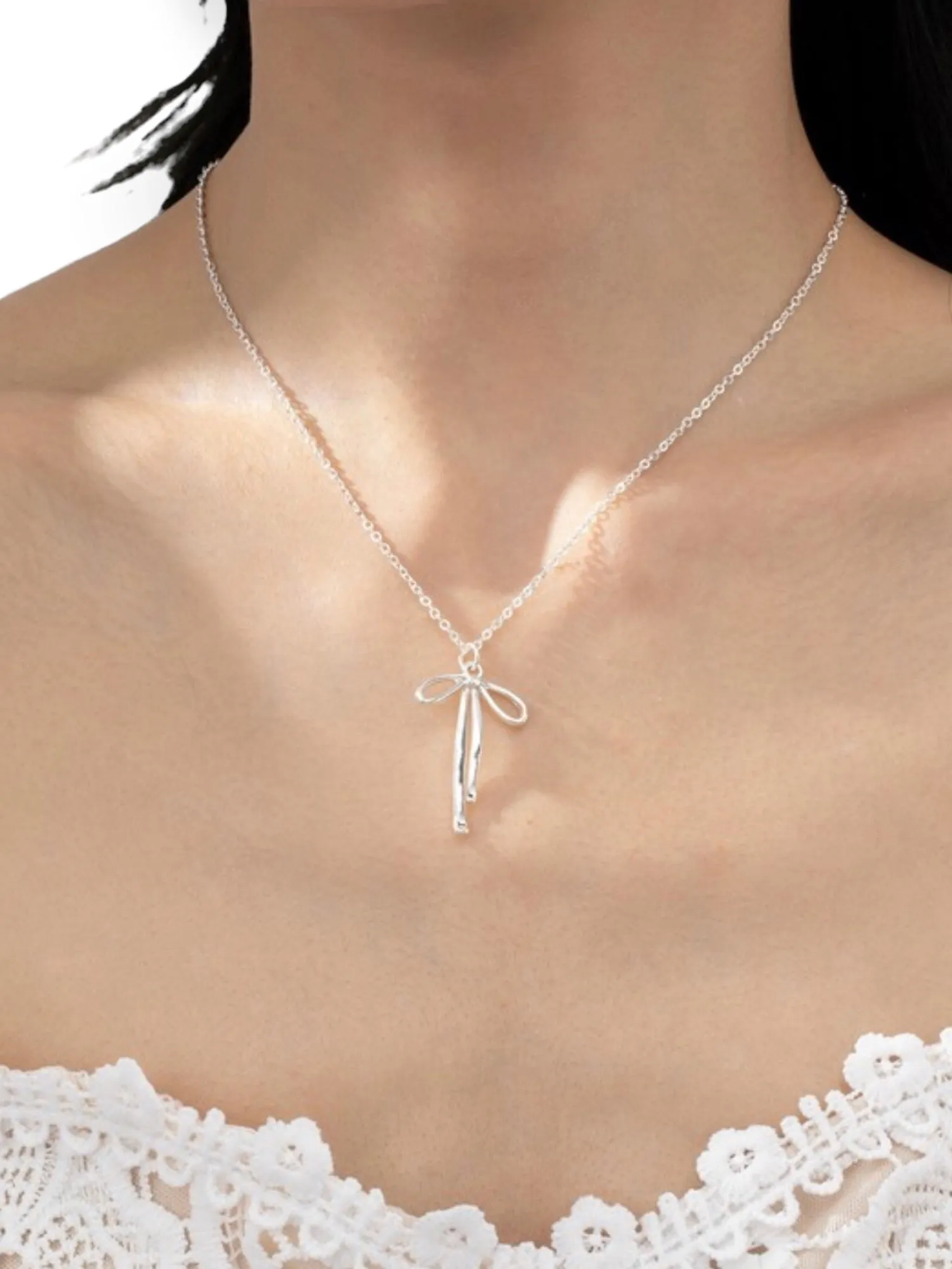 Cypress Brass Bow Pendant Necklace