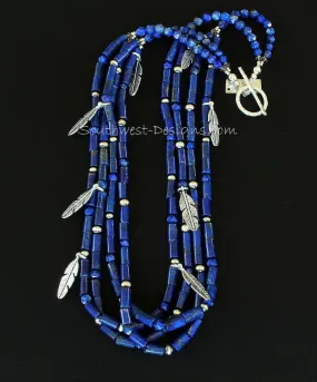 Lapis Lazuli Cylinder Bead 4-Strand Necklace with Lapis Faceted Rounds, Sterling Silver Oxidized Rounds, Sterling Feather Charms, and Hammered Sterling Silver Toggle Clasp
