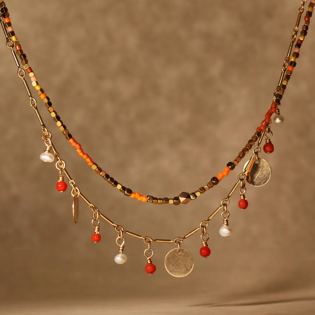 Semi precious coral and pearl hanging stones necklace