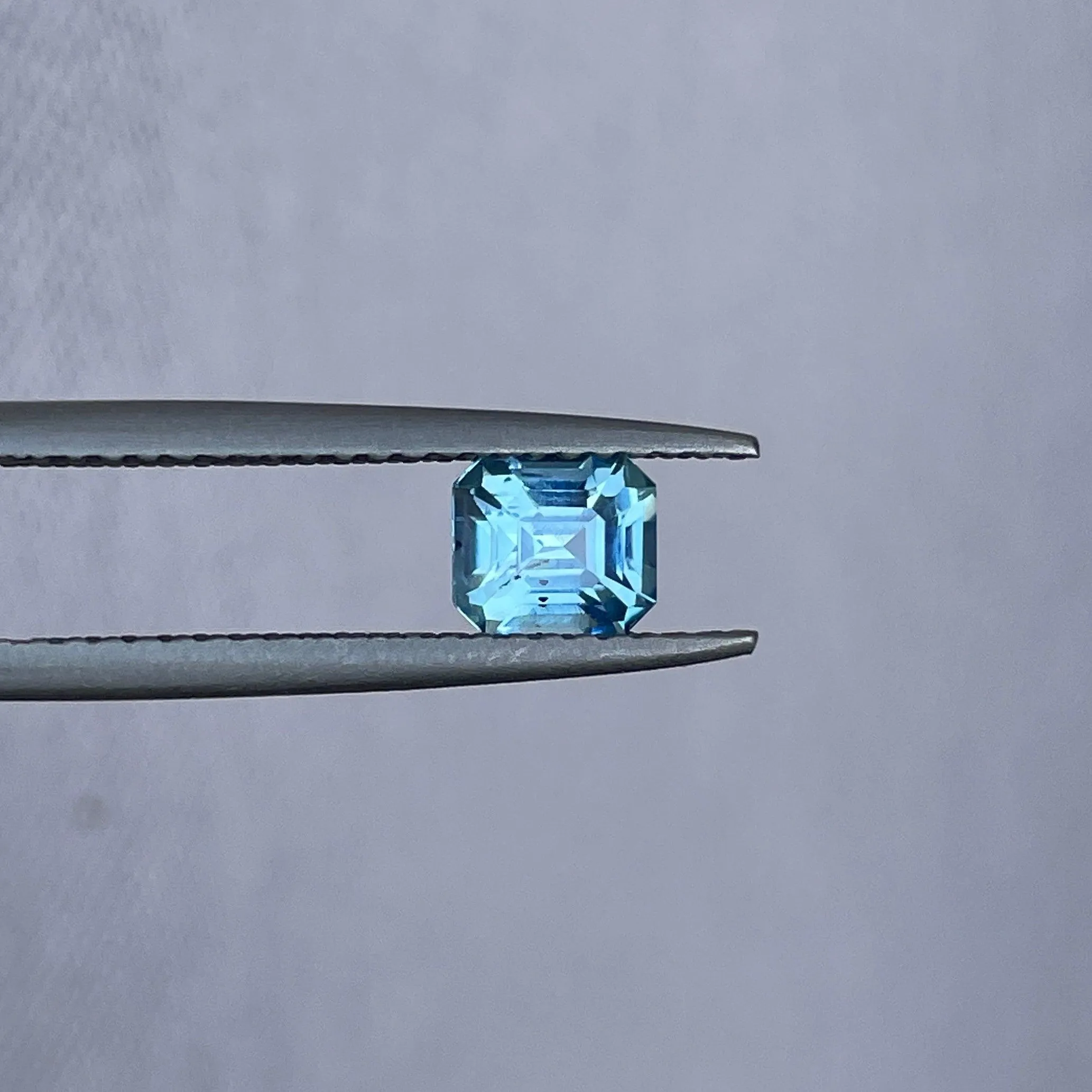 Teal sapphire | natural, bluish green, Emerald cut, VVS, 0.78ct, Madagascar