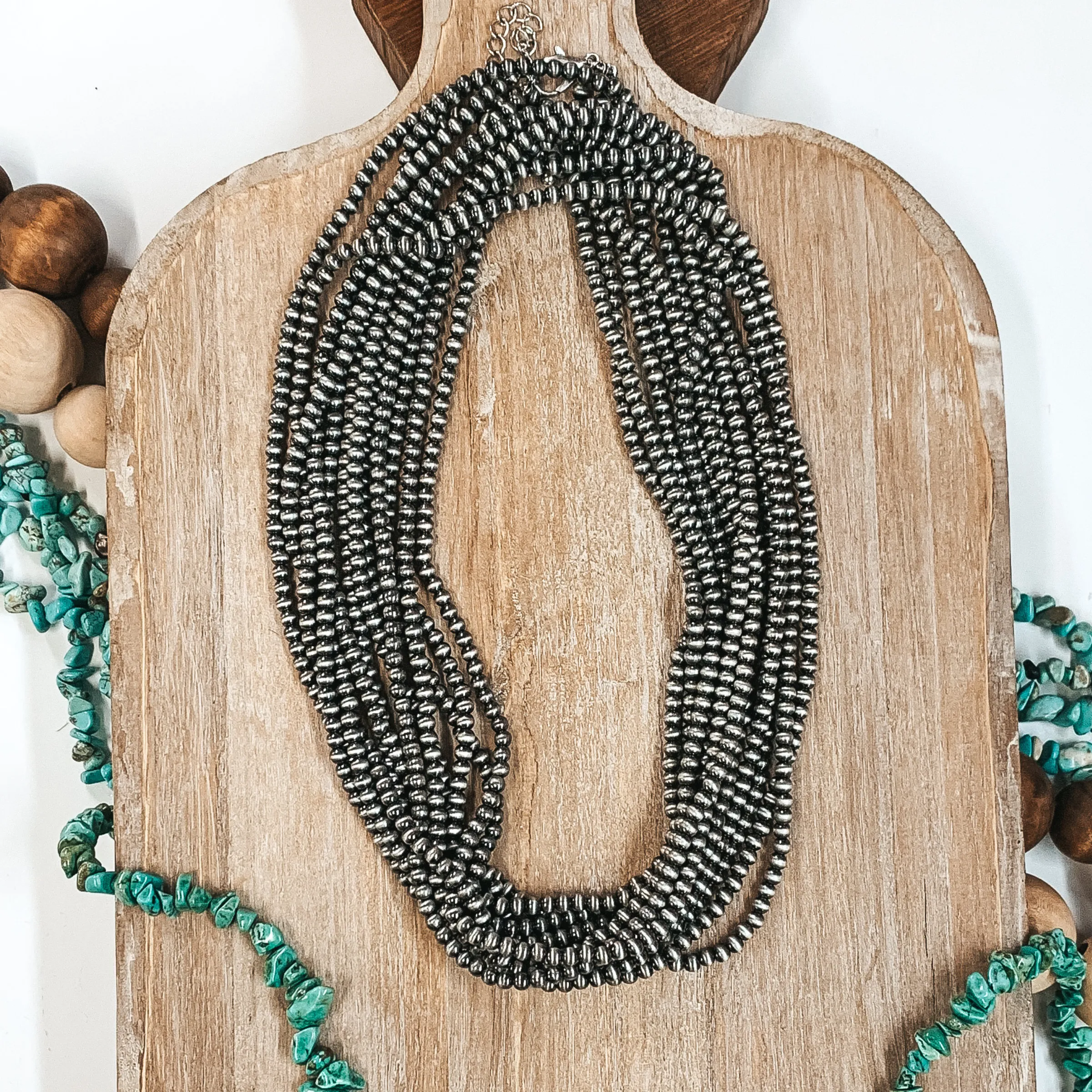 Three Strands of Long Faux Navajo Pearls in Silver Tone