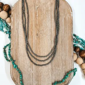Three Strands of Long Faux Navajo Pearls in Silver Tone