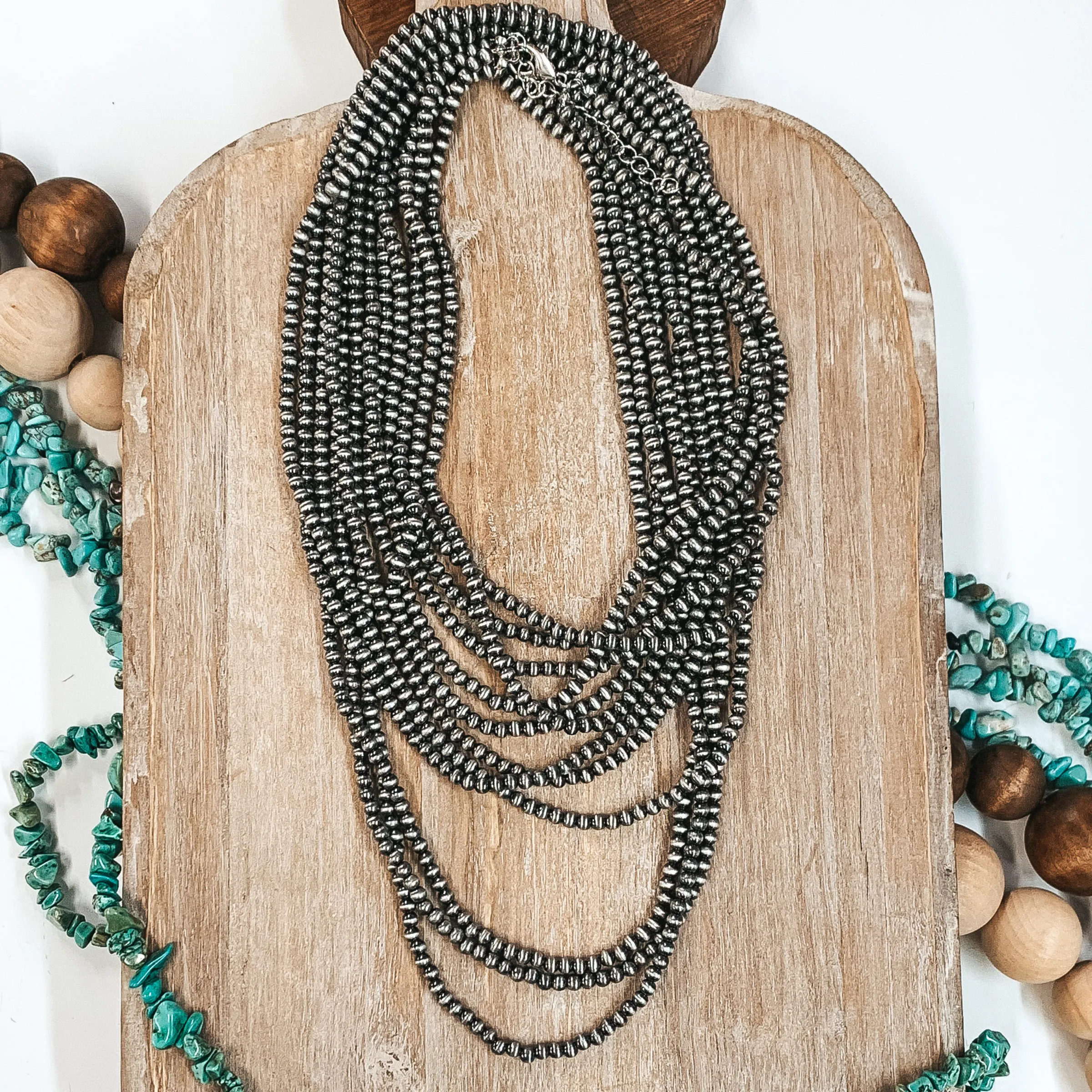 Three Strands of Long Faux Navajo Pearls in Silver Tone